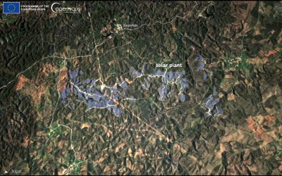 A satellite image shows the Alcoutim Solar Plant in Portugal. The solar plant area is highlighted in blue in the lower half of the image, surrounded by a landscape of green and brown terrain. The nearby settlement of Vaqueiros is labeled at the top of the image. Roads and pathways are visible, connecting the solar plant and surrounding areas. A scale bar at the bottom left indicates a distance of 500 meters. The image includes logos of the European Union and Copernicus at the top left corner.